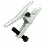 Outil pour retirer les rotules des axes de pivot