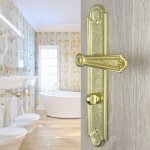 Ouvre&d�co - 2 poign�es de porte regence condamnation, laiton poli entraxe 195 mm