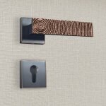 Poign�e de porte design � cylindre finition aspect cuivre patin� noir luna - katchmee