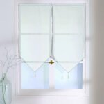 Petits voilages unis en polyester � pointes et pompons blanc 60x90 cm