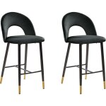 Beliani - 2 tabourets chaises hautes de bar en velours noir pieds noirs et dorés design et confort pour ... Beliani - 2 tabourets chaises hautes de bar en velours noir pieds noirs et dorés design et confort pour ...