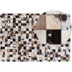 Beliani - tapis rectangulaire blanc beige et noir en cuir patchwork pour intérieur moderne 140 x 200 ... Beliani - tapis rectangulaire blanc beige et noir en cuir patchwork pour intérieur moderne 140 x 200 ...