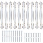 Ensemble de 10 poign�es de meubles vintage, de style antique, sculpt�es et cintr�es (trou central de ...