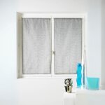 Petit voilage  la paire en organza uni gris clair 80x160 cm