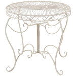Clp - table ronde avec un style romantique orn de diffrentes dcorations de couleurs colore : crme ...