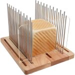 Trancheuse à pain en acier inoxydable - guide réglable, pliable et compacte, construction en bois durable ... Trancheuse à pain en acier inoxydable - guide réglable, pliable et compacte, construction en bois durable ...