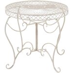 Clp - table ronde avec un style romantique orn� de diff�rentes d�corations de couleurs colore : cr�me ...