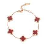 Tr�fle � quatre feuilles - bracelet acier inoxydable r�versible(rouge)