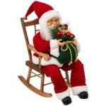 F��ric lights and christmas - p�re no�l habit traditionnel rouge et blanc assis dans son rocking chair ...