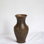 D�tenteurs de stands en r�sine avec d�coration d'amphore