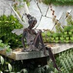 Ornement de jardin f�e magique assise, tudor et turek assis en r�sine d�coration de jardin 91222 cm