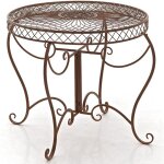 Clp - table ronde avec un style romantique orn� de diff�rentes d�corations de couleurs colore : antique ...