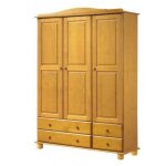 Armoire, meuble de rangement en pin massif coloris miel avec 3 portes et 4 tiroirs - longueur 130 x profondeur ... Armoire, meuble de rangement en pin massif coloris miel avec 3 portes et 4 tiroirs - longueur 130 x profondeur ...