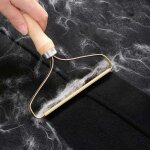 Brosse anti - poils et bouloches compatible avec tous types de vêtements Brosse anti - poils et bouloches compatible avec tous types de vêtements