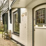 Cloche de porte en fonte finition doree