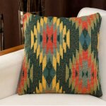 Coussin ethnique ? motif aztque fond vert izmir