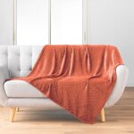 Douceur d'int�rieur - plaid flanelle 125x150 cm - relief feuillage - terracotta