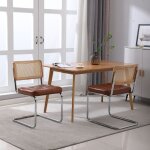 Lot de 2 chaises de salle  manger - style du milieu du sicle - en simili - cuir tapisses et en rotin ...