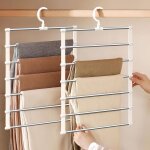 Lot de 2 cintres pliables pour pantalons, gain de place dans la garde - robe, cintres pliables pour suspendre ...