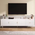 Meuble tv blanc Élégant avec 2 tiroirs + 3 portes, poignées et pieds dorés, pieds réglables, 170 x 35. ... Meuble tv blanc Élégant avec 2 tiroirs + 3 portes, poignées et pieds dorés, pieds réglables, 170 x 35. ...