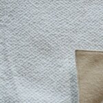 Tissu thermique bouclette 525g / m2 ecru 140 cm