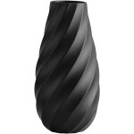 Vase en céramique noir avec design en spirale texturée, idéal pour une décoration moderne, minimaliste ... Vase en céramique noir avec design en spirale texturée, idéal pour une décoration moderne, minimaliste ...