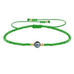 Bracelet lien perle d'eau douce noire et petites perles brillantes - vert