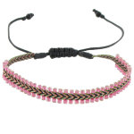 Les poulettes bijoux bracelet tiss� noir et rose perles rose