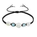 Les poulettes bijoux bracelet lien tr�ss� noir perles de larimar et oeil de ste lucie