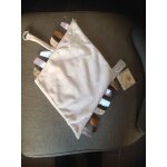 Doudou lapin diinglisar attach� t�tine