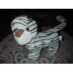 Peluche tigre blanc de marque toys compny import , yeux brodés , cordon de suspension sur le dessus de ... Peluche tigre blanc de marque toys compny import , yeux brodés , cordon de suspension sur le dessus de ...
