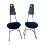 2 chaises en porte � faux