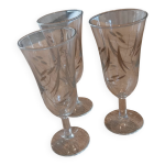 3 fltes  champagne en cristal cisels.