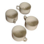 4 tasses en faïence de sarreguemines écrue et dorée 4 tasses en faïence de sarreguemines écrue et dorée