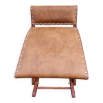 Ancien repose - pied vintage en cuire