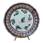 Ancienne assiette  fleurs liser marron dit cul noir