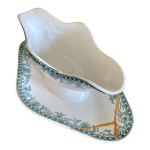 Ancienne saucire rpare avec la technique japonaise du kintsugi