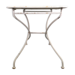 Ancienne table de jardin pliante en fer forgé blanche Ancienne table de jardin pliante en fer forgé blanche
