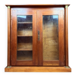 Armoire porte fusils de style empire en merisier vers 1900