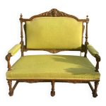 Banquette en bois massif richement sculpt de style louis xvi .