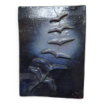 Bas relief  vol d'hirondelles