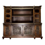 Bibliothque style renaissance en noyer massif sculpt, vers 1850