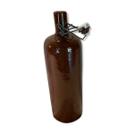 Bouteille ancienne en grs avec un bouchon mcanique en porcelaine