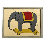 Cadre puzzle en bois des annes 30 / 40 reprsentant un lphant de cirque