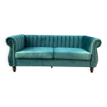 Canapé chesterfield en velours vert émeraude Canapé chesterfield en velours vert émeraude