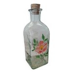 Carafe en verre avec motif floral