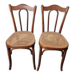 Chaises de bistrot cannées en chêne x 2 Chaises de bistrot cannées en chêne x 2