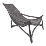 Chaise longue transat vintage en rotin noir Chaise longue transat vintage en rotin noir