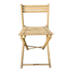 Chaise pliante ancienne à lattes de bois Chaise pliante ancienne à lattes de bois
