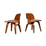Chaises de salle à manger en contreplaqué de noyer charles et ray eames, modèle dcw, herman miller Chaises de salle à manger en contreplaqué de noyer charles et ray eames, modèle dcw, herman miller
